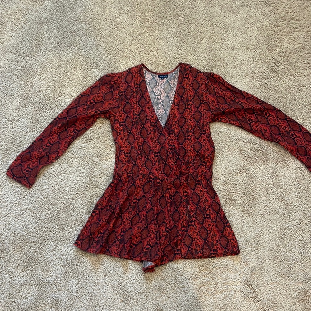 Never worn blue life romper from planet blue